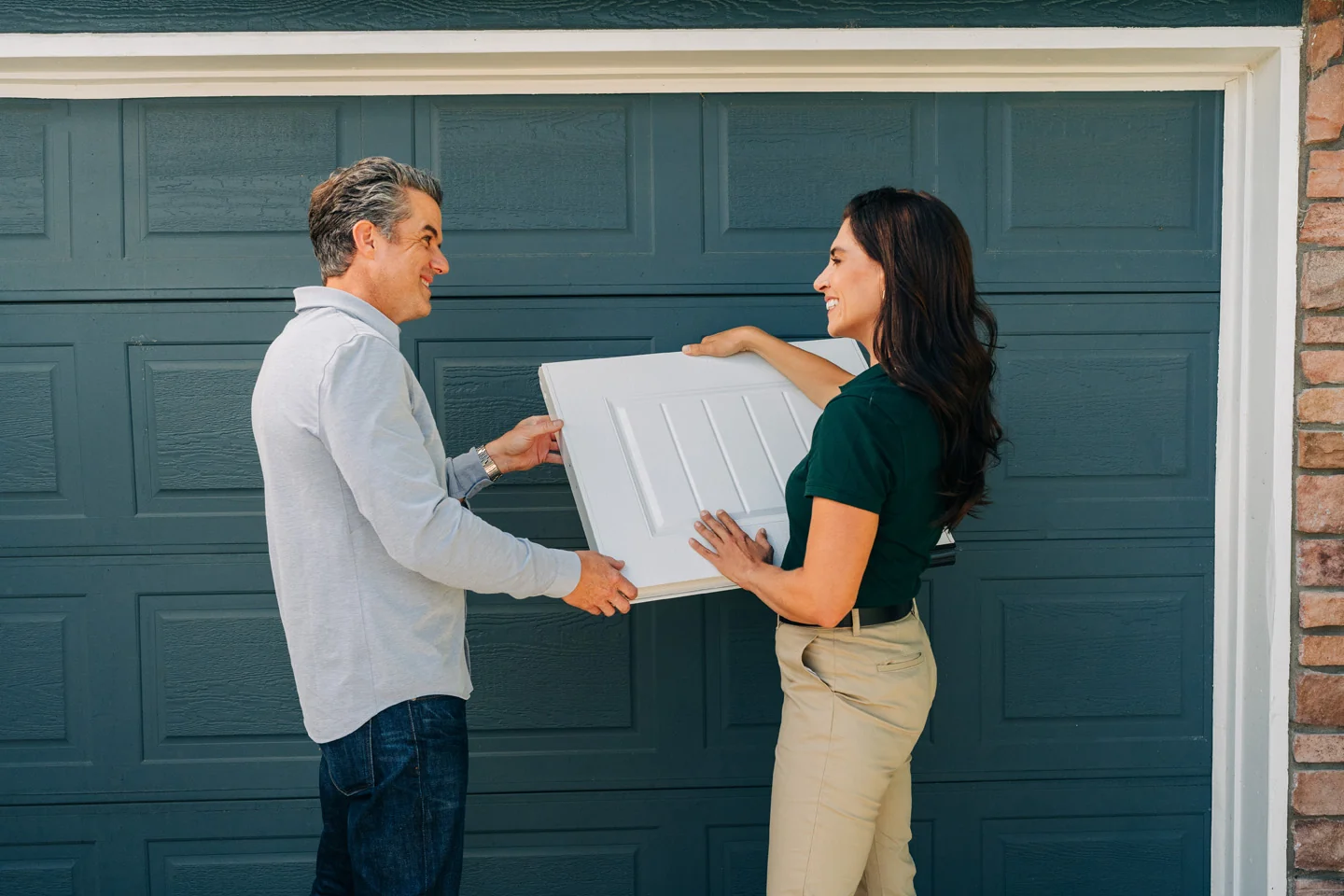 Customer buying a new garage door from Precision Garage Door Customer buying a new garage door from Precision Garage Door